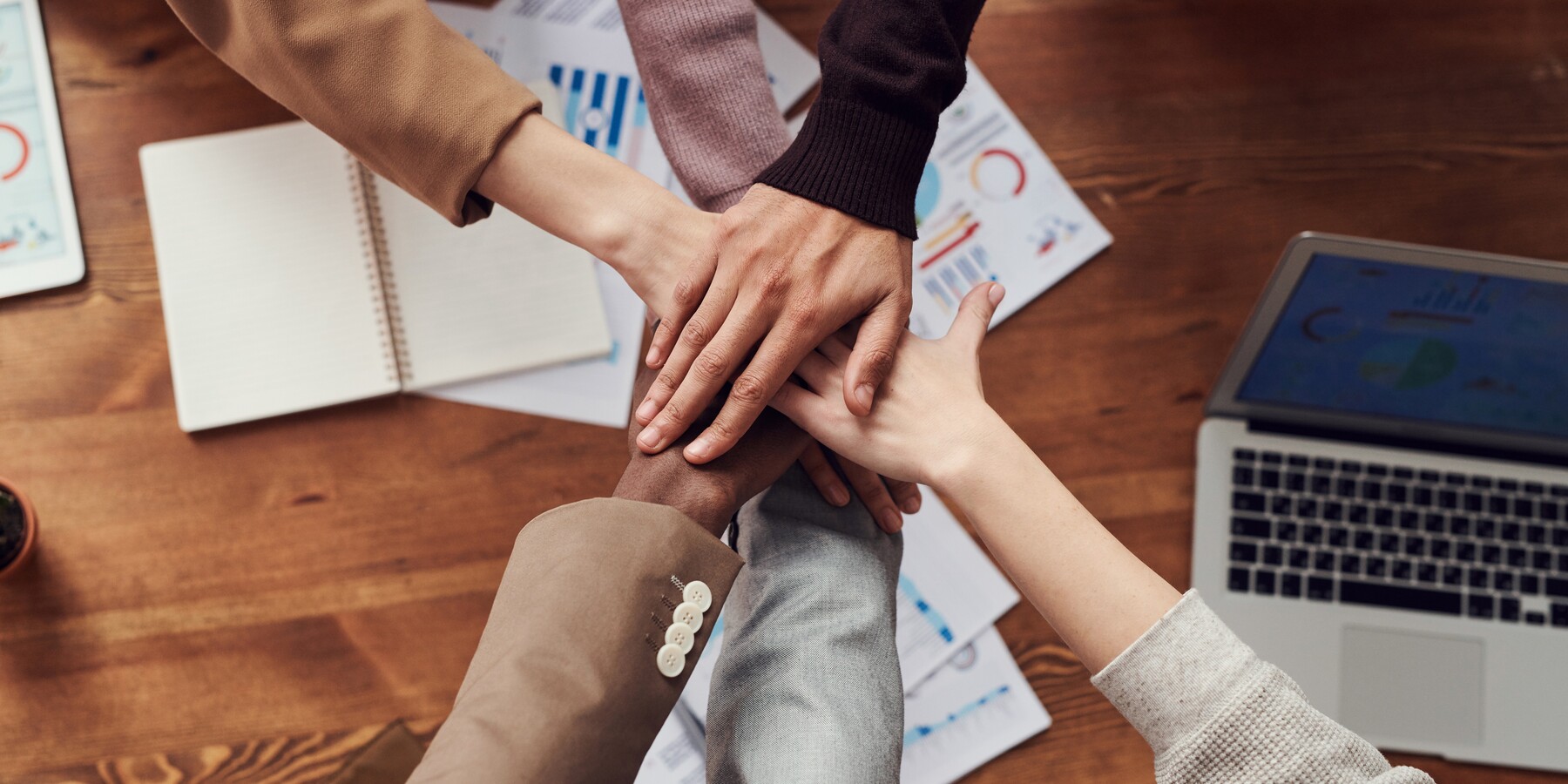 People collaborate at a table.