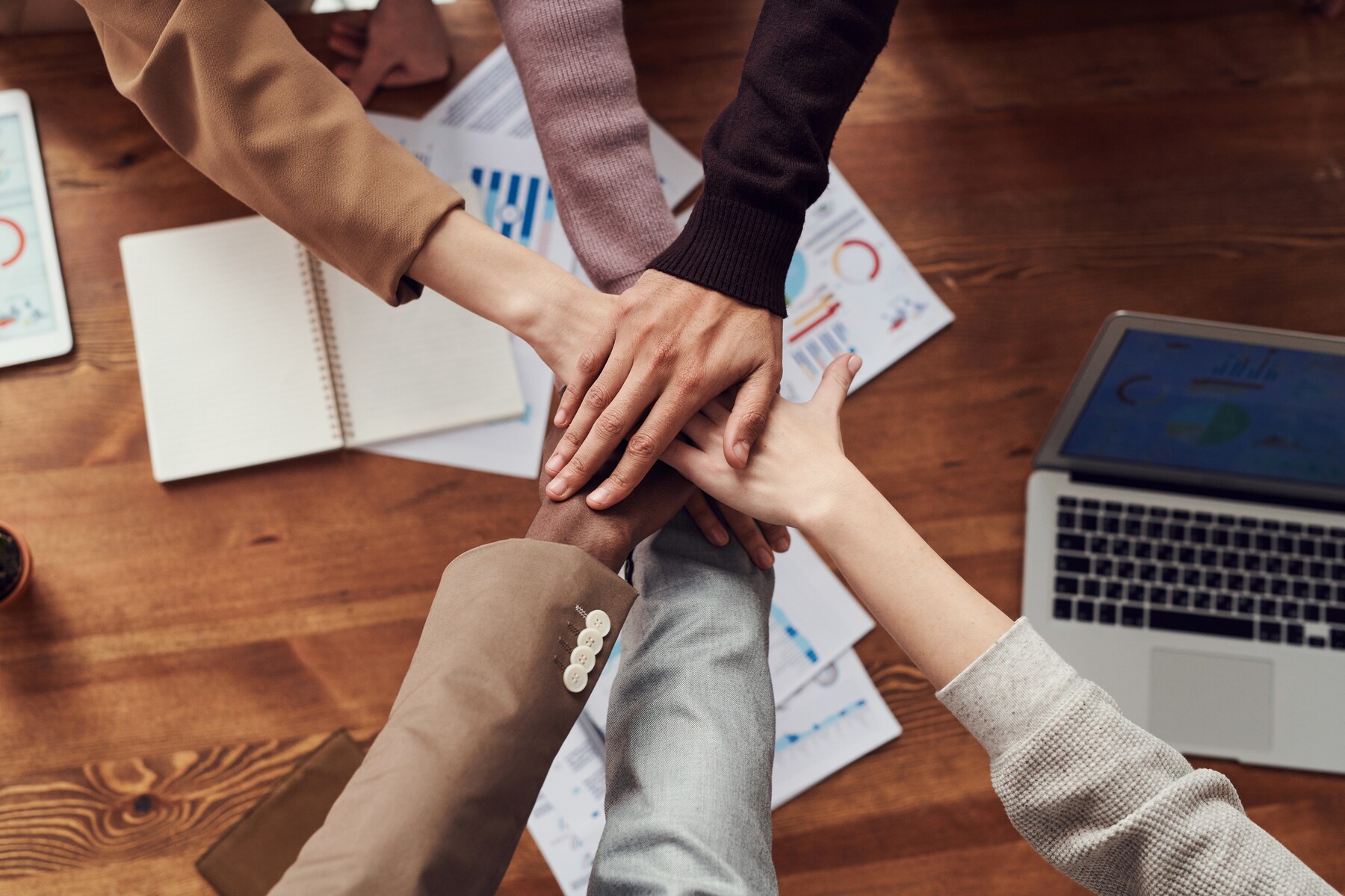 People collaborate at a table.